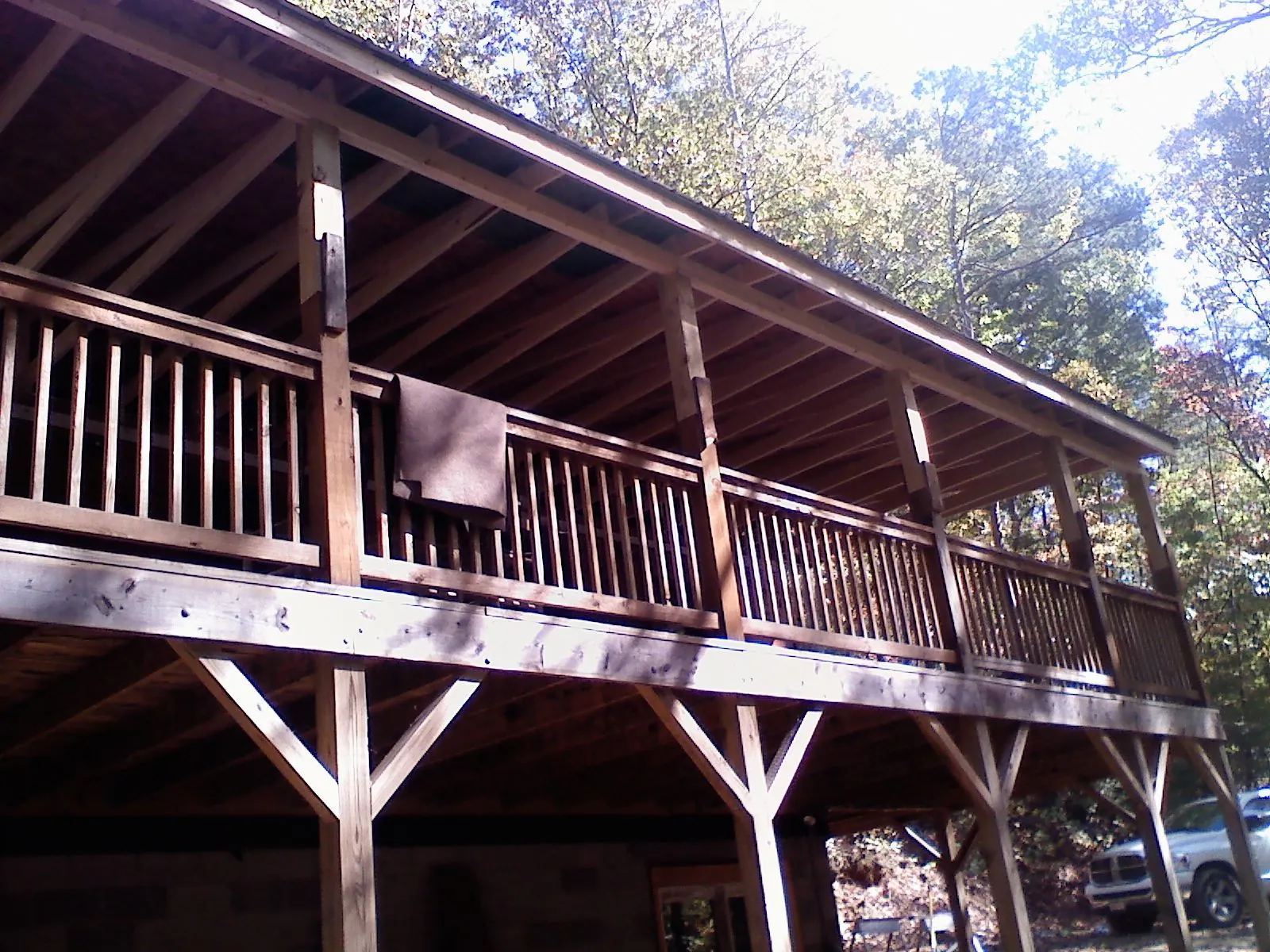 Timber framing under a new elevated porch and deck — Roof Leak Repair in Wheat Ridge by Roofing Brothers